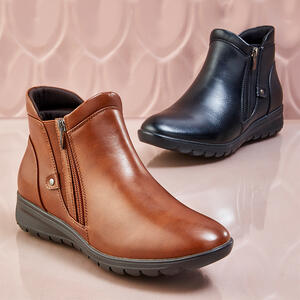 KELPIE Wedge Bootie by  Bare Traps
 * Elasticised Zip Bootie
 * Black and Tan
 * Sizes 36 to 42
Low Rubber Wedge
Just $79.95
https://www.baretraps.com.au/buy/shoes~boots/kelpie-tan