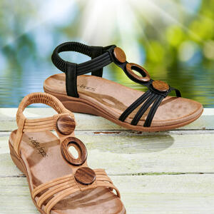 PRIMA Wood Trim Footbed Sandal by Bare Traps
* Elastic Straps pull-on Sandal
* Footform Comfort Sock
* Low Rubber Wedge
Black and Tan 
https://www.baretraps.com.au/buy/shoes~footbed-sandals/prima-tan

 #casualsandals #springsandals #wedges